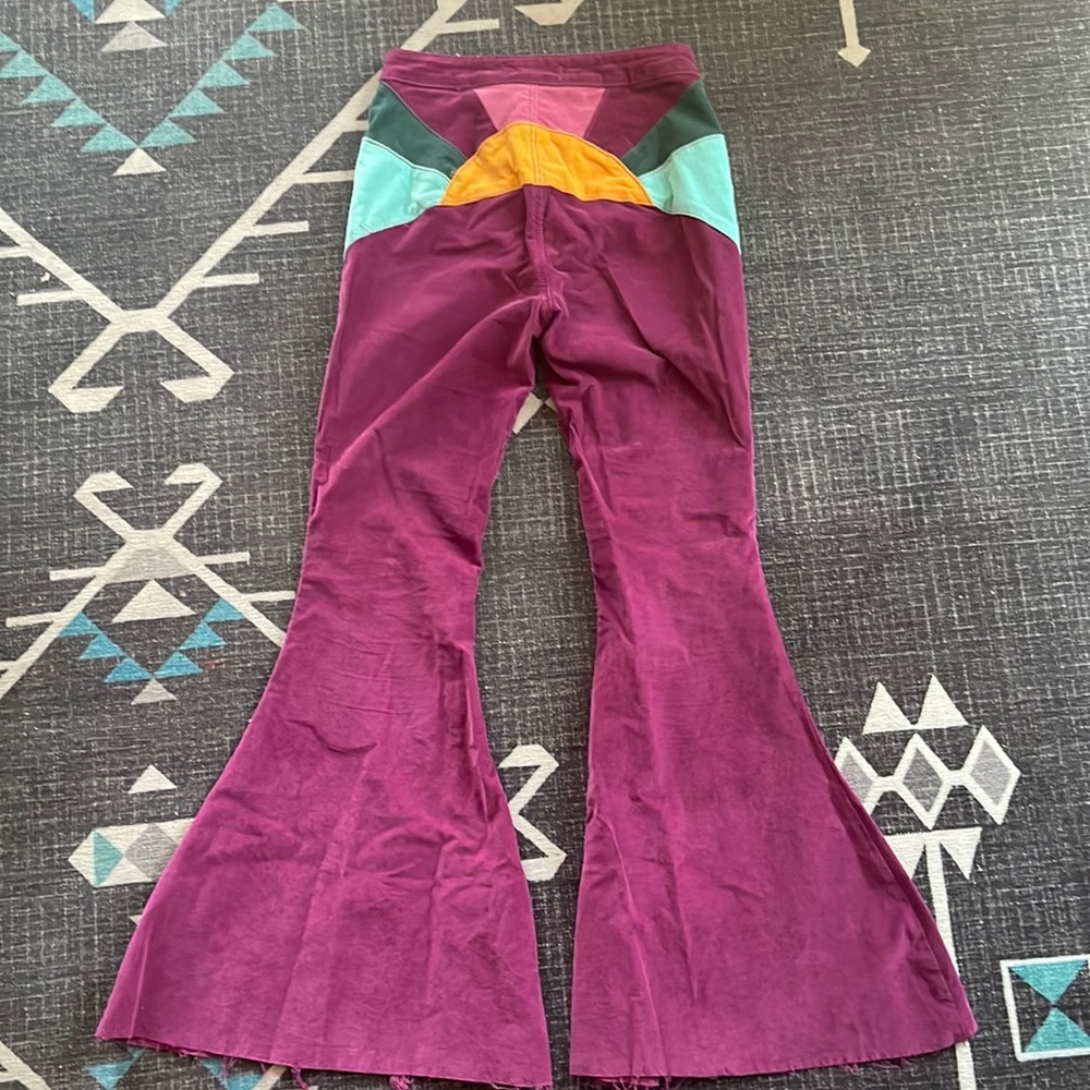 We the free purple Ray of Sunshine cords